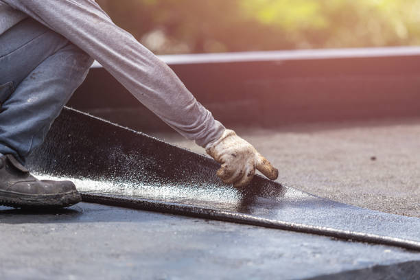 Professional Emergency Waterproofing technician working in Clarksburg, IN